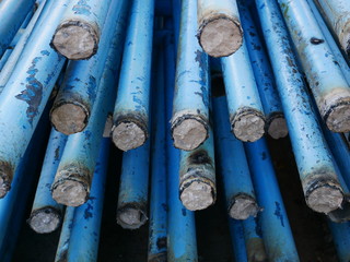 blue used metal pipe background, dirty steel tube, old iron pipe, aluminum