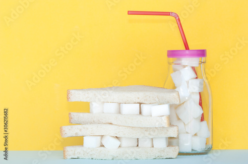 Fotomural Sandwich with sugar and glass full of sugar cubes