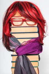 Wall Mural - Funny education concept with beautiful teacher girl with luxurious red hair