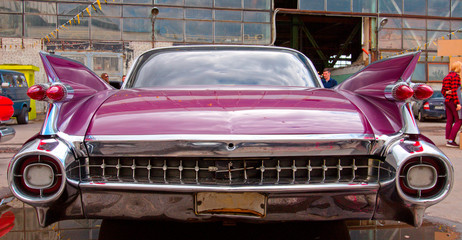 Wall Mural - Classical American Vintage car. Back view.