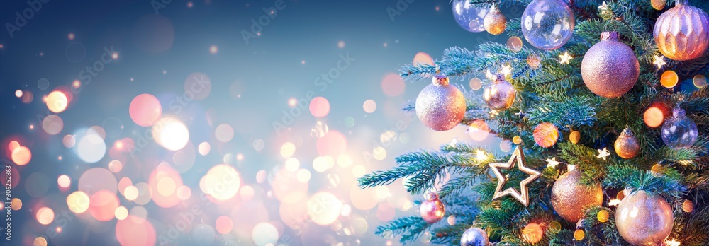 Christmas Tree With Golden Baubles And Shiny Lights In Blue Background - obrazy, fototapety, plakaty 