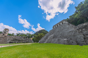 Ancient Mayan ruins in Palenque, Chiapas, Mexico. Mayan ruins in the middle of the jungle on a sunny day.