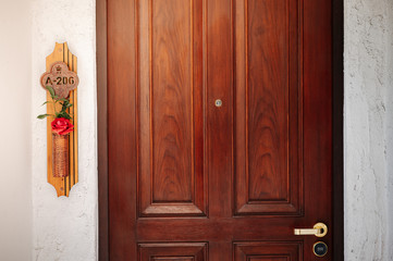 The front door of the bedroom has flowers.