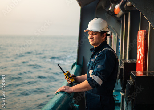 Cuadros en Lienzo Marine Deck Officer or Chief mate on deck of offshore vessel or ship , wearing PPE personal protective equipment - helmet, coverall