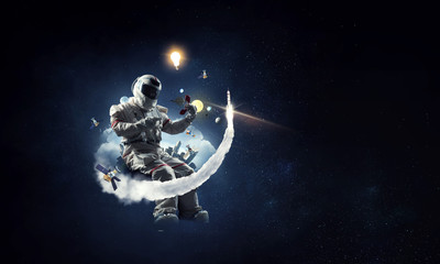 Wall Mural - spaceman and his mission. mixed media
