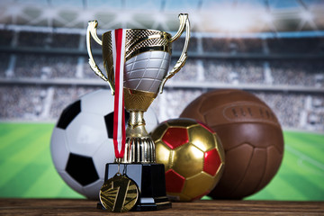 Award winning and championship concept, trophy cup on sport background