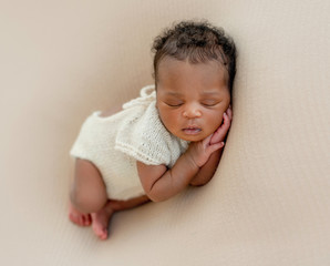 innocent african newborn asleep