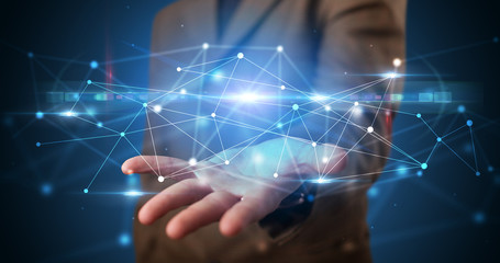 Handsome person holding hologram screen displaying modern cloud based web system technology
