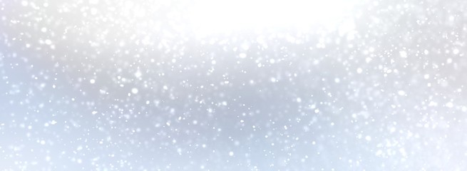 white snow on light blue shade background. silver bright shine abstract banner. blurred pattern. sub