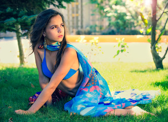 portrait of beautiful cute brunette teenager model with makeup, poreo, in summer colorful swimsuit p