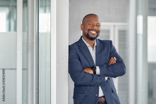 Successful businessman in modern office Poster Mural XXL