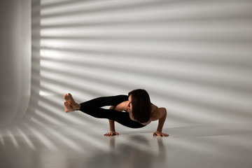 Wall Mural - Young girl doing yoga, girl doing yoga exercises