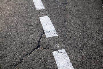 White broken road marking line