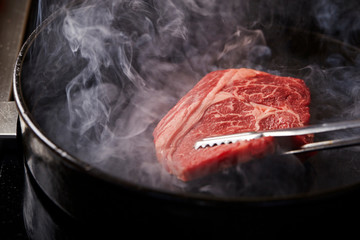 Beef steak on hot iron plate