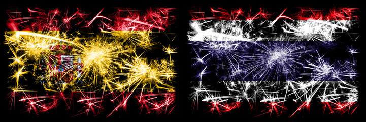 Spanish vs Thailand, Thai New Year celebration sparkling fireworks flags concept background. Combination of two abstract states flags.