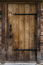 Old Door From Wooden Boards To The Bathhouse.