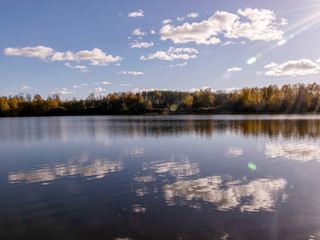 Wall Mural - colorful autumn landscape by the lake, golden autumn, colorful trees and reflections