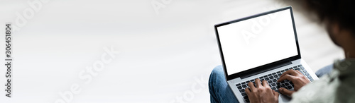 Fotomural Young Man Using Laptop At Home
