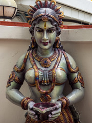 Wall Mural - Colourful statue of Hindu religious deity in Hindu temple in Singapore