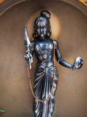 Wall Mural - Statue of Hindu religious deity in Hindu temple in Singapore	