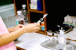 © Atiwat - Image of nurse hands is preparing the injection for the patient.