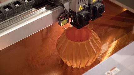 Wall Mural - Close-up 3D printer creates vase. Action. Modern automated 3D printer machines can create any object. Process of creating vase on 3D printer