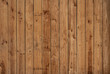 Dark old vertical wood panels with nice patterns and knotholes