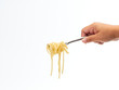 © jittima - hand holding fork handle roll spaghetti line