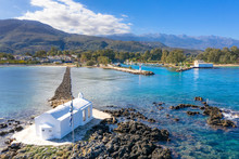Small White Church Saint Nikolaos In The Sea, Georgioupoli, Crete, Greece.