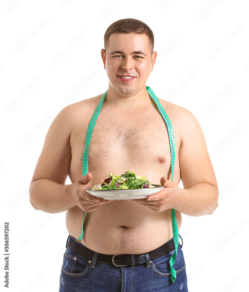 Overweight man with measuring tape and salad on white background. Diet concept
