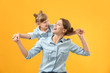 © Pixel-Shot - Portrait of happy mother and daughter on color background