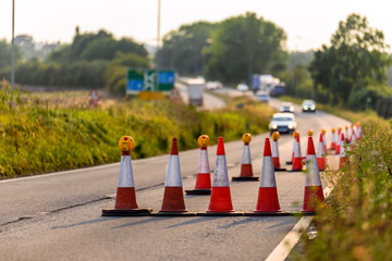 Wall Mural - sunset view uk motorway services roadworks cones