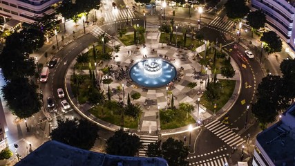 Wall Mural - Big roundabout - Aerial hyperlapse - Dizengoff square in tel Aviv, Israel, at night, 4k drone view