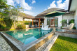 © Stock PK - Swimming pool in tropical garden pool villa feature floating balloon