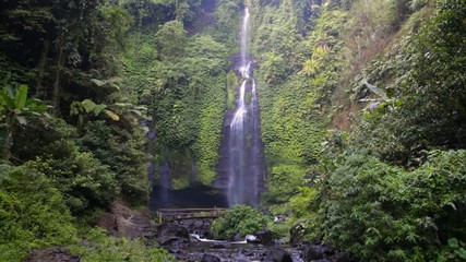 Wall Mural - Bali sekumpul waterfall tourist attraction in tropical rain forest