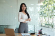 asian executive businesswoman woman smiling at business workplace