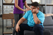 © New Africa - Woman comforting her depressed overweight friend at home