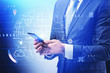 © ImageFlow - Businessman with smartphone, global connection