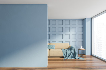 Wall Mural - Blue living room with beige sofa and mock up wall