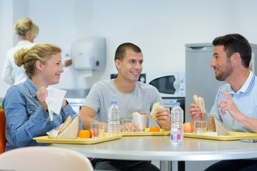 people having lunch break together