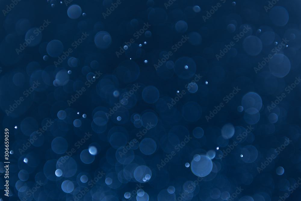 abstract sparkle bokeh light effect with navy blue background Stock ...