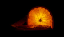 Sliced Lighted Orange In The Night