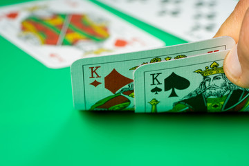  poker playing cards on green background