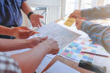 Soft Focus,A team of UI / UX web designers are working together to develop a mobile responsive website with UI UX Front End Designer Previewing.