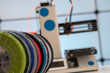 Sticker - 3D Printer Plastic filament for 3D printer and printed products in the interior of the design office