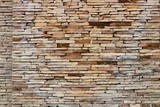 Fototapeta Desenie - Natural brown and gray color of stone bricks wall background, Decoration outside wall of building.