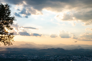 Wall Mural - The Sun is falling behind the mountain and city view the beautiful river