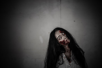 Portrait of asian woman make up ghost face,Horror scene,Scary background,Halloween poster