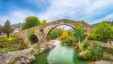 Roman Hump-backed Bridge On The Sella River In Cangas De Onis, Asturias, Spain