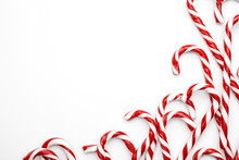 Frame Made With Christmas Candy Canes On White Background. Minimal Composition With Peppermint Candies. Top View